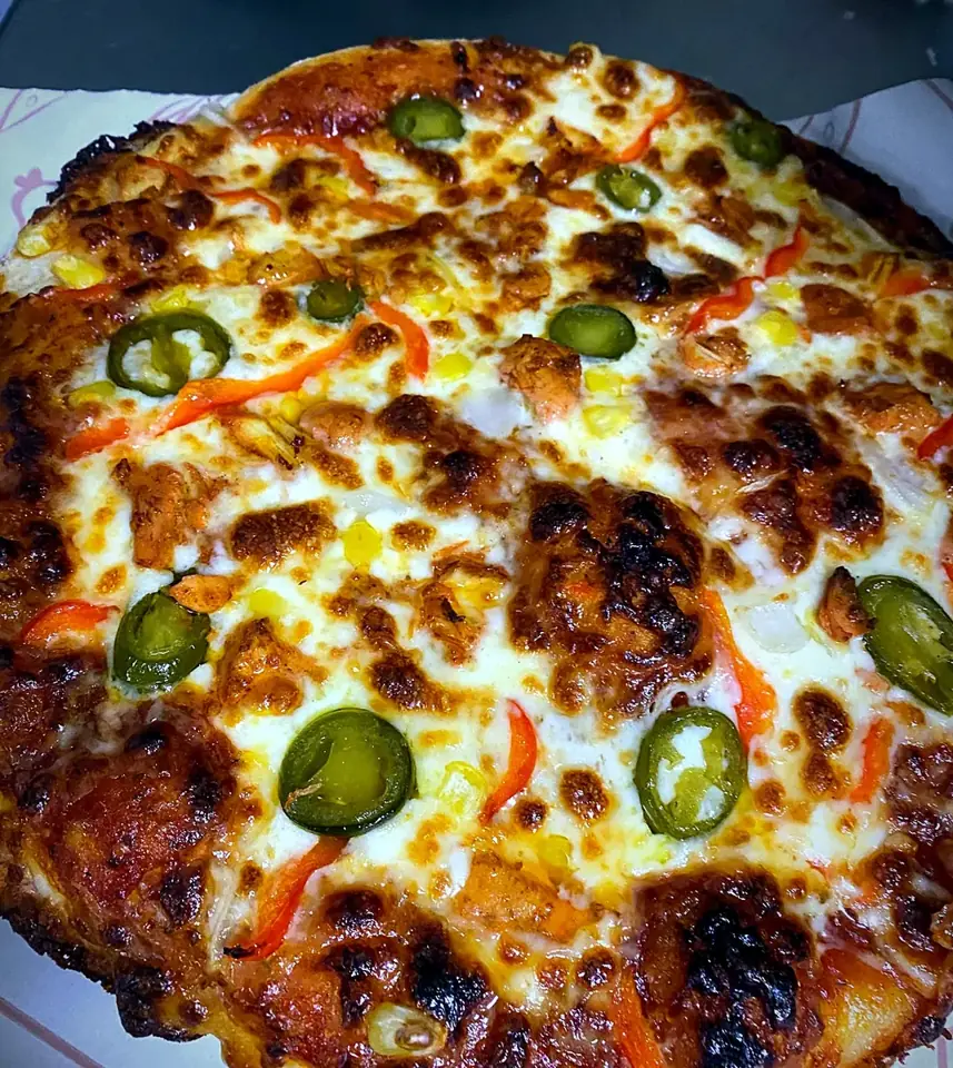 Deep-pan pizza with jalapeños